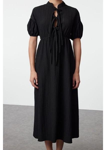 Kadın Moda Şık Maxi Boy Hakim Yaka Regular Fiyonk Detaylı Dokuma Elbise