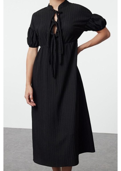 Kadın Moda Şık Maxi Boy Hakim Yaka Regular Fiyonk Detaylı Dokuma Elbise fiyatları