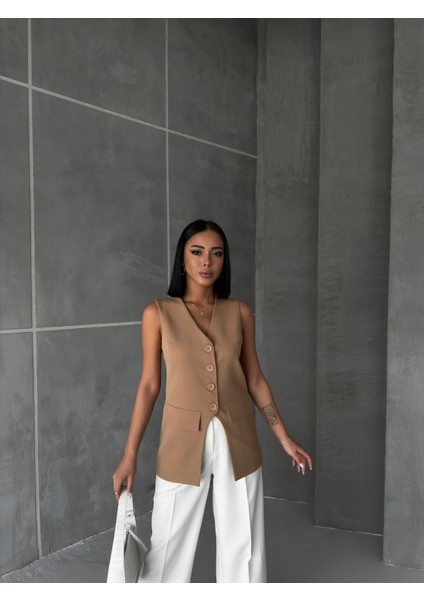 Kadın Asimetrik Detaylı Düğmeli Cep Kapaklı Yelek fırsatları