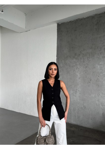 Kadın Asimetrik Detaylı Düğmeli Cep Kapaklı Yelek fırsatları