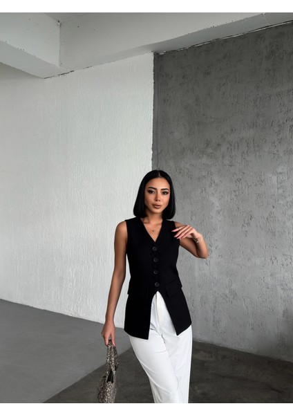 Kadın Asimetrik Detaylı Düğmeli Cep Kapaklı Yelek indirimleri