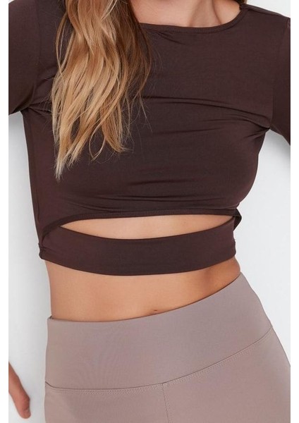 Kadın Crop Bisiklet Yaka Fitted Kalıp Örme Pencere Cut Out ve Baş Parmak Delik Detaylı Spor Üst Bluz modelleri