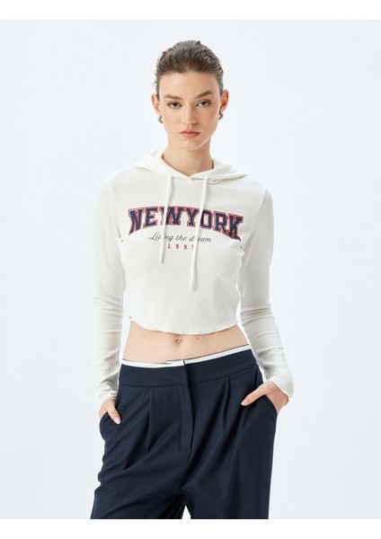 Uzun Kollu Slim Fit Fitilli Baskılı Kapüşonlu Crop Tişört fiyatları