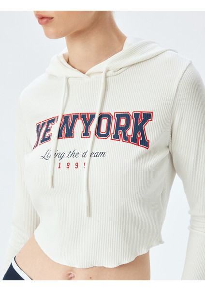 Uzun Kollu Slim Fit Fitilli Baskılı Kapüşonlu Crop Tişört indirimleri