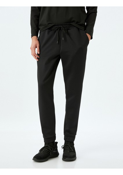Beli Bağcıklı Cep Detaylı Jogger Scuba Kumaş Spor Eşofman Altı modelleri