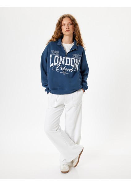 Yarım Fermuarlı Sweatshirt Oversize Kolej Baskılı Cep Detaylı fiyatları