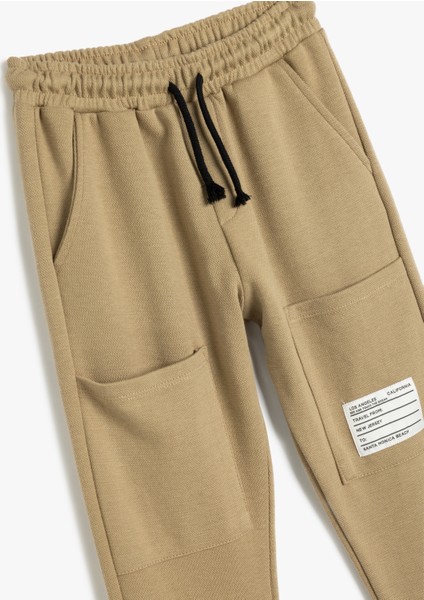 Jogger Eşofman Altı Beli Bağlamalı Paçaları Fermuar Detaylı Pamuklu modelleri