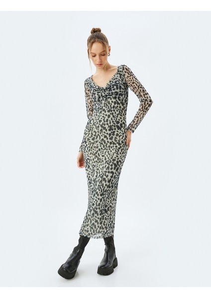 Degaje Yaka Uzun Kollu Sırt Detaylı Midi Boy Leopar Tül Elbise