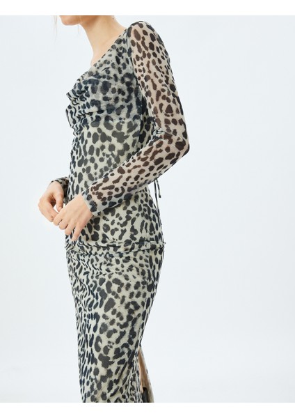 Degaje Yaka Uzun Kollu Sırt Detaylı Midi Boy Leopar Tül Elbise indirimleri
