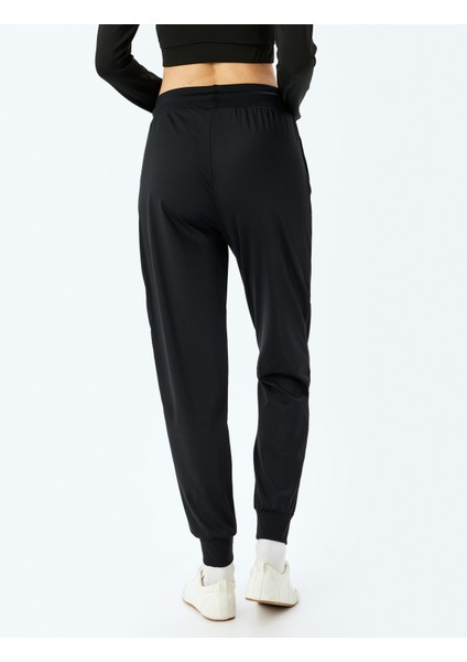 Cep Detaylı Yüksek Bel Bağcıklı Yumuşak Tuşe Jogger Spor Eşofman Altı Interlok fırsatları