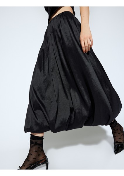 x Melis Ağazat - Standart Bel Oversize Uzun Saten Balon Etek indirimleri