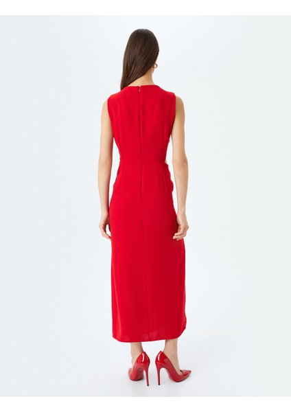 Yırtmaçlı Pencere Detaylı Yuvarlak Yaka Kolsuz Kruvaze Uzun Elbise fırsatları