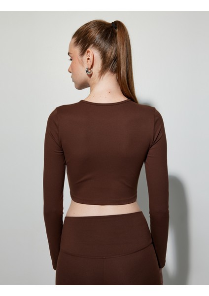 Crop Spor Tişört Bisiklet Yaka Uzun Kollu Yumuşak Tuşe Slim Fit fırsatları