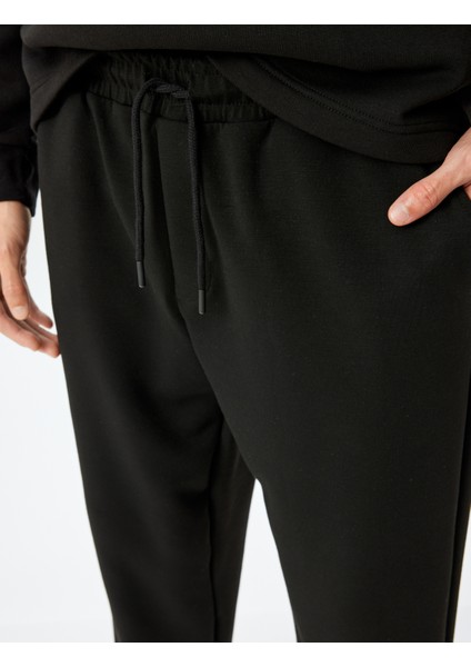 Beli Bağcıklı Lastikli Paça Cep Detaylı Viskon Karışımlı Eşofman Altı