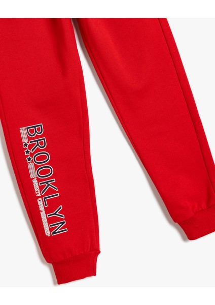 Jogger Eşofman Altı Cepli Baskılı Beli Bağlamalı modelleri
