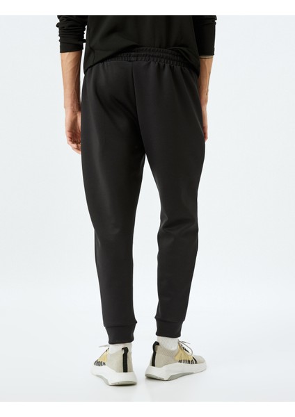 Beli Bağcıklı Fermuarlı Cep Detaylı Scuba Kumaş Jogger Spor Eşofman Altı