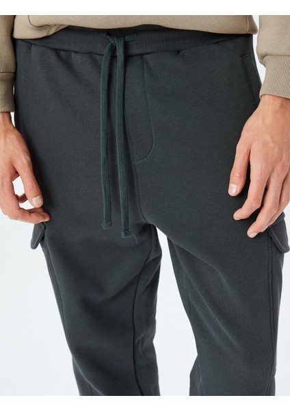 Beli Bağcıklı Pamuk Karışımlı Şardonlu Kargo Cepli Eşofman Altı indirimleri