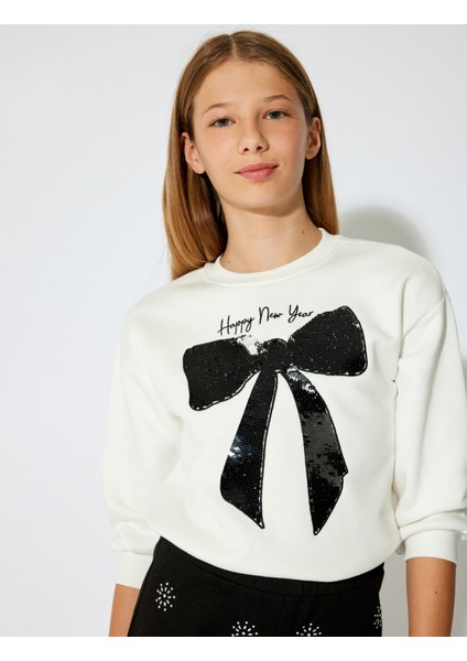 Yılbaşı Temalı Pullu Payetli Fiyonk Detaylı Sweat fiyatları