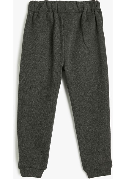 Eşofman Altı Beli Lastikli Düğme Detaylı Cepli fiyatları