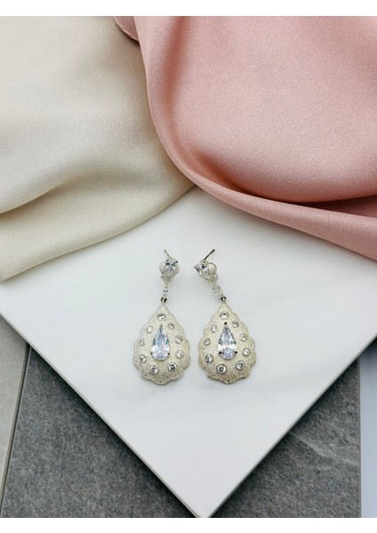 Damla Montürlü Sallantılı Çelik Küpe modelleri