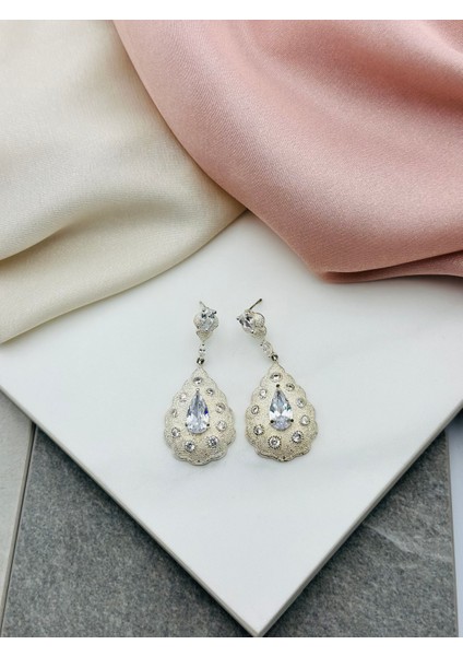 Damla Montürlü Sallantılı Çelik Küpe fırsatları