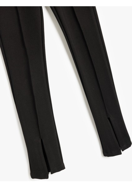 Basic Tayt Beli Lastikli Dikiş Detaylı Yırtmaçlı modelleri