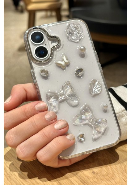 Apple iPhone 16 Uyumlu Kurdele Fiyonk Kelebek Inci Taşlı Figürlü Şeffaf Kılıf