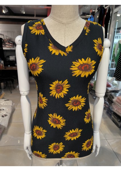 Mazıdağı Kadın V Yaka Kolsuz Ayçiçeği Desen Krep Bluz fırsatları