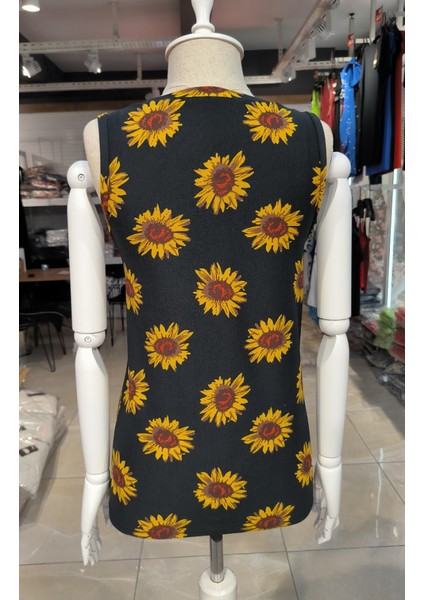 Mazıdağı Kadın V Yaka Kolsuz Ayçiçeği Desen Krep Bluz indirimleri