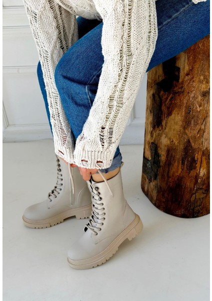 Kalın Tabanlı Bej Fermuarlı ve Bağcıklı Uzun Kaymaz Taban Kadın Cilt Bot