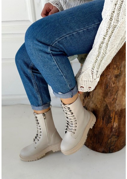 Kalın Tabanlı Bej Fermuarlı ve Bağcıklı Uzun Kaymaz Taban Kadın Cilt Bot fiyatları