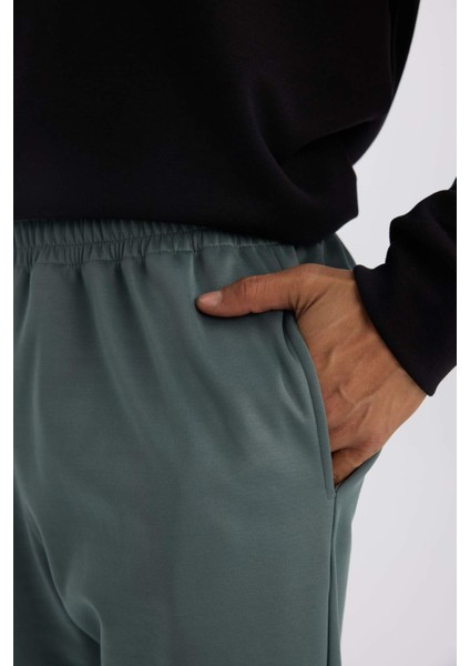 Fit Sporcu Jogger Eşofman Altı Standart Fit Basic Düz Cepli Beli Paçası Lastikli D3742AX24WN fırsatları