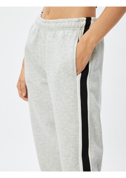 Oversize Jogger Eşofman Altı Beli Bağcıklı Şerit Detaylı Cepli Şardonlu indirimleri