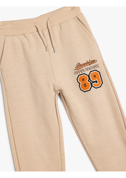 Jogger Eşofman Altı Beli Bağlamalı Spor Baskı Detaylı