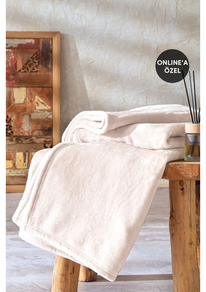 Yumuşak ve şık 140x190 ekru polyester battaniye, rahat uyku arkadaşı