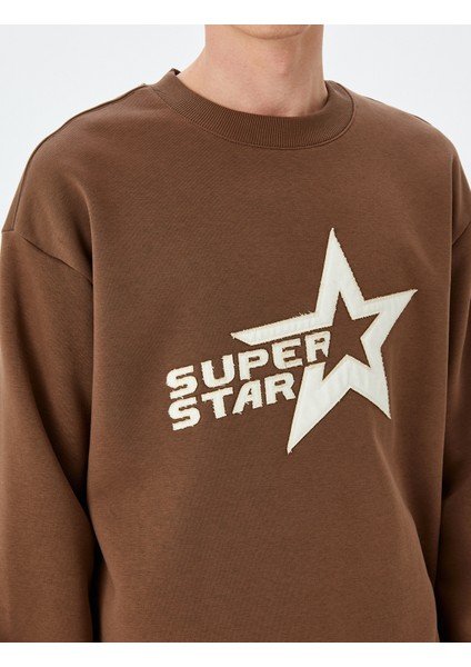 Bisiklet Yaka Oversize Pamuk Karışımlı Slogan Baskılı Sweatshirt indirimleri