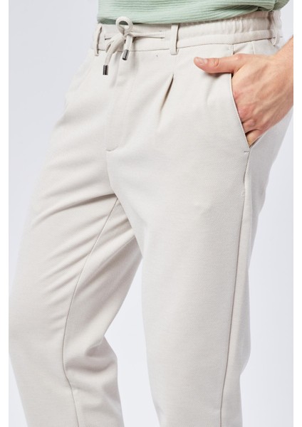 Erkek Beli Bağcıklı Yandan Cepli Slim Fit Jogger Bej Pantolon fırsatları