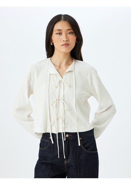 Rahat Kalıp Viskon Keten Karışımlı Uzun Kollu Dokulu Fiyonk Bağlama Detaylı Bluz modelleri