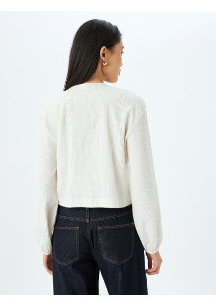 Rahat Kalıp Viskon Keten Karışımlı Uzun Kollu Dokulu Fiyonk Bağlama Detaylı Bluz fırsatları