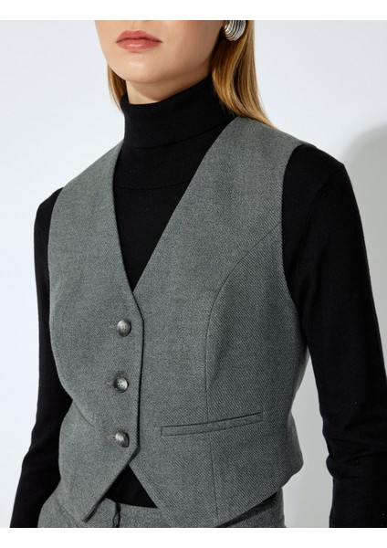 x Şahika Ercümen - Düğmeli V Yaka Kruvaze Blazer Yelek indirimleri