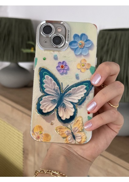 Paladyum Case iPhone 15 Plus Uyumlu Lens Korumalı Simli Kelebekli Çiçekli Kılıf