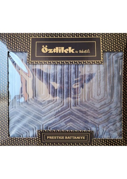 Şık gri tek kişilik yumuşak battaniye, sıcaklık ve konfor sağlar.