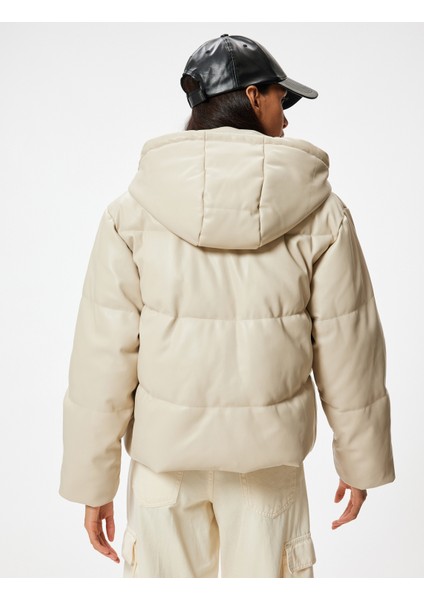 Şişme Mont Deri Görünümlü Kapüşonlu Fermuarlı Cep Detaylı fırsatları