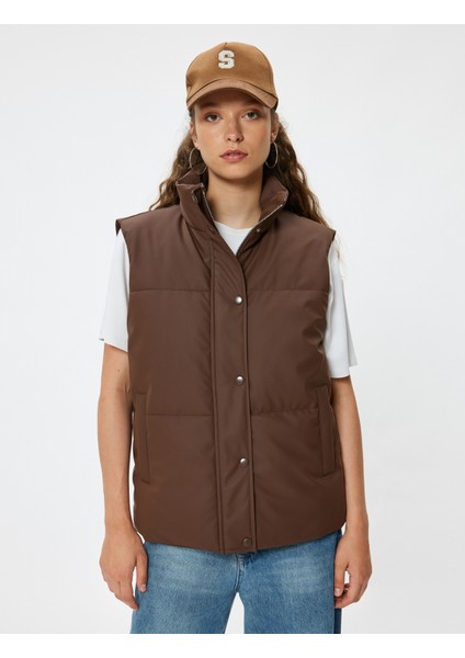 Şişme Yelek Kolsuz Kapitone Fermuarlı Dik Yaka Cep Detaylı modelleri