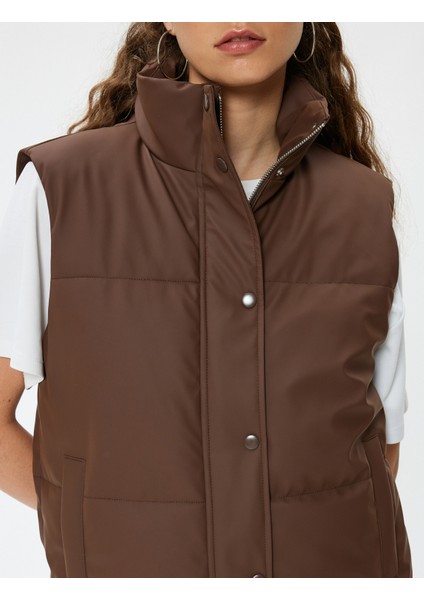 Şişme Yelek Kolsuz Kapitone Fermuarlı Dik Yaka Cep Detaylı indirimleri