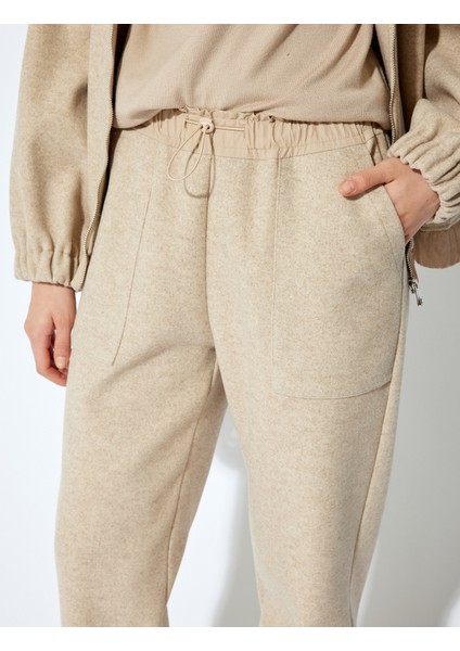 x Şahika Ercümen - Yumuşak Dokulu Cepli Eşofman Pantolon indirimleri