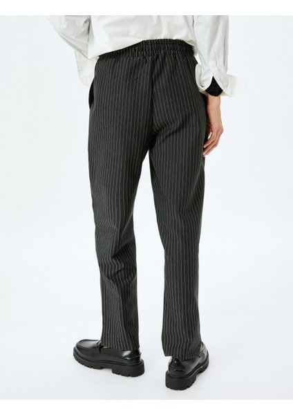 Beli Lastikli Bağlamalı Çizgili Havuç Kesim Kumaş Pantolon fırsatları