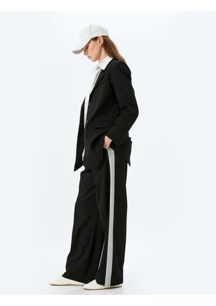 Cepli Düz Bol Paça Yanları Şerit Detaylı Kumaş Pantolon fiyatları