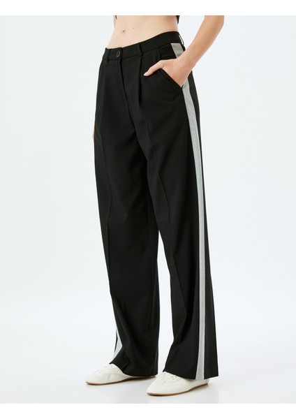 Cepli Düz Bol Paça Yanları Şerit Detaylı Kumaş Pantolon modelleri