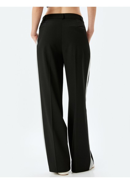 Cepli Düz Bol Paça Yanları Şerit Detaylı Kumaş Pantolon fırsatları